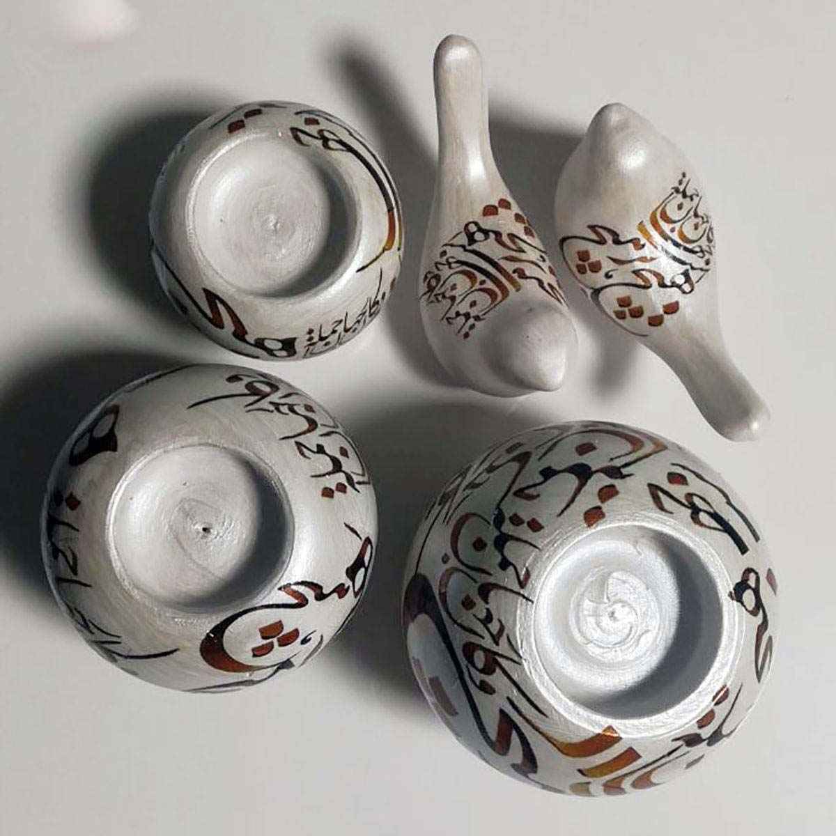 حامل شموع الشاي الإيراني من الفخار – نموذج خط عربي