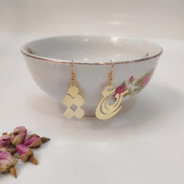 أقراط نحاسية إيرانية بنموذج عشق