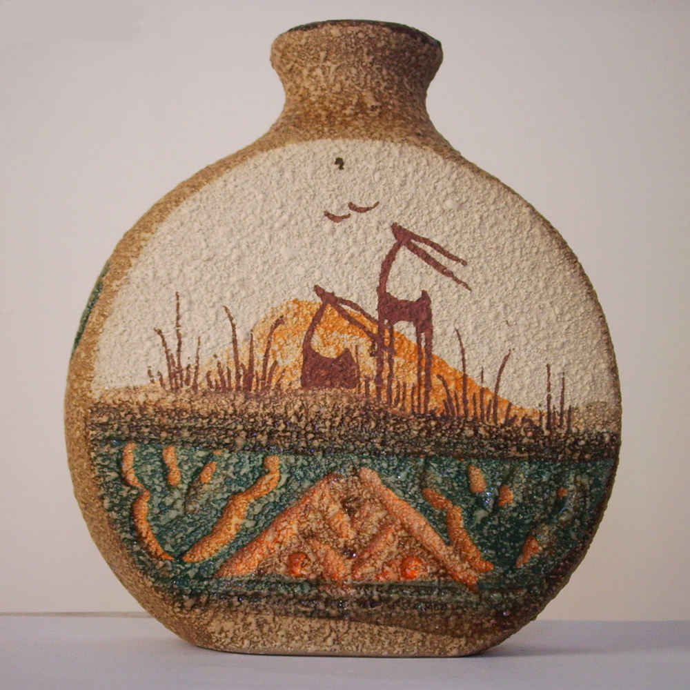 فازة زهور خزفية صغيرة بتصميم فني، مناسبة للديكور والهدية