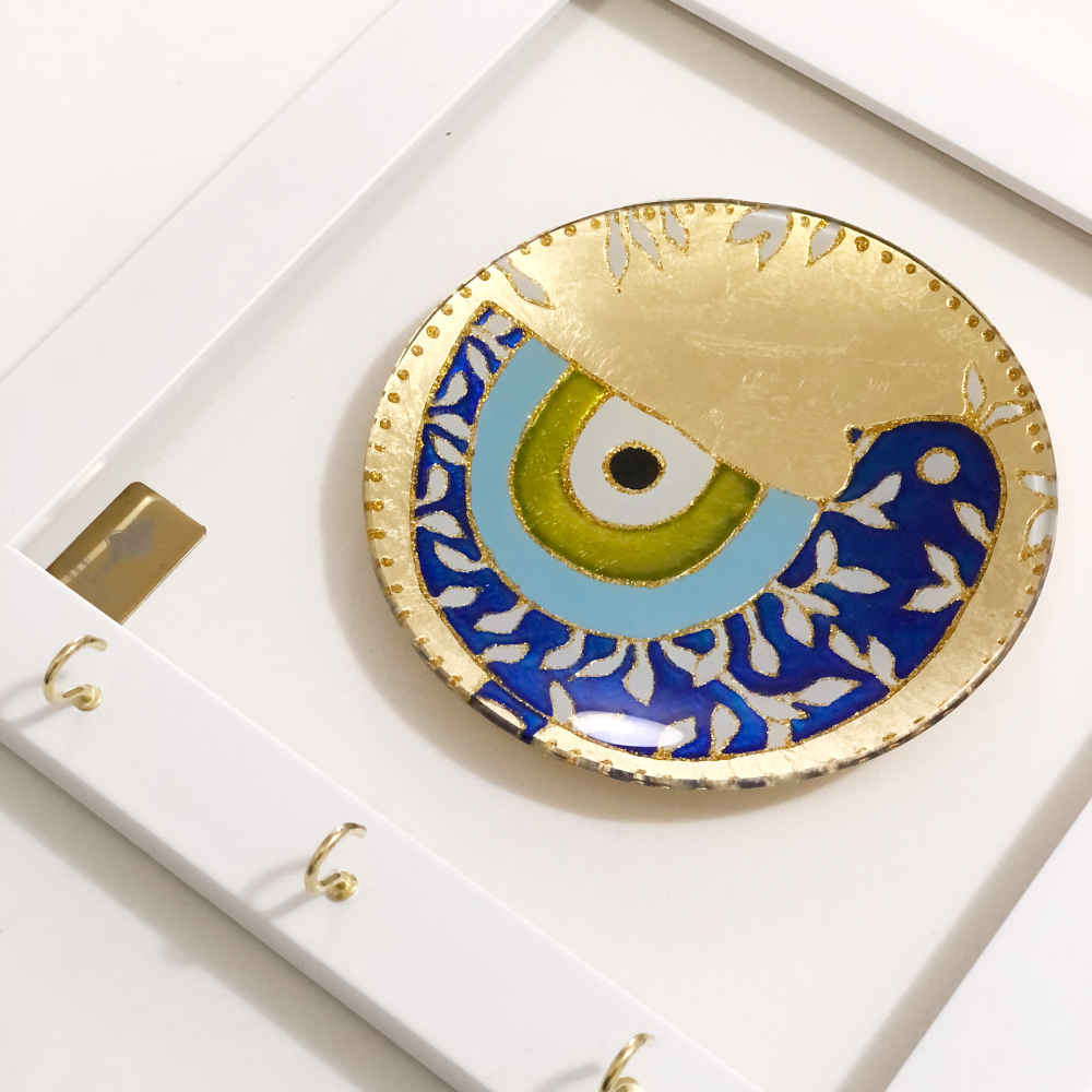 حامل مفاتيح جداري خشبي مزخرف بتصميم عين الحسد ٤٥