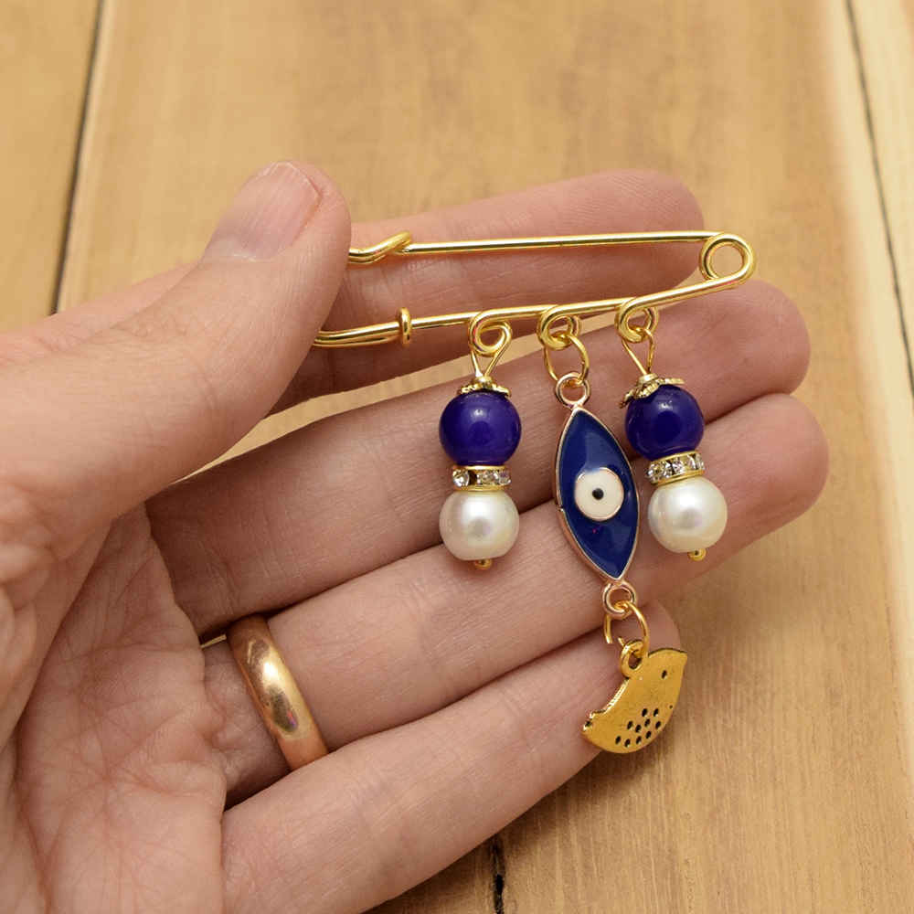 دبوس أمان بعين الشر وسحر الطائر – ملحق حماية