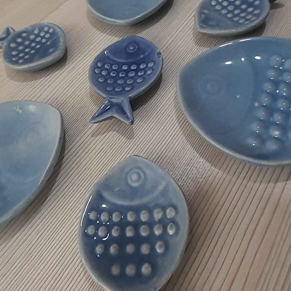 مجموعة أطباق الفخار للسبعة مناسبة للاحتفال بنوروز سمك