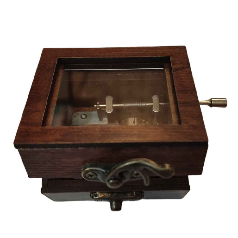 صندوق خشبي موسيقي يعمل يدوياً نموذج لحن