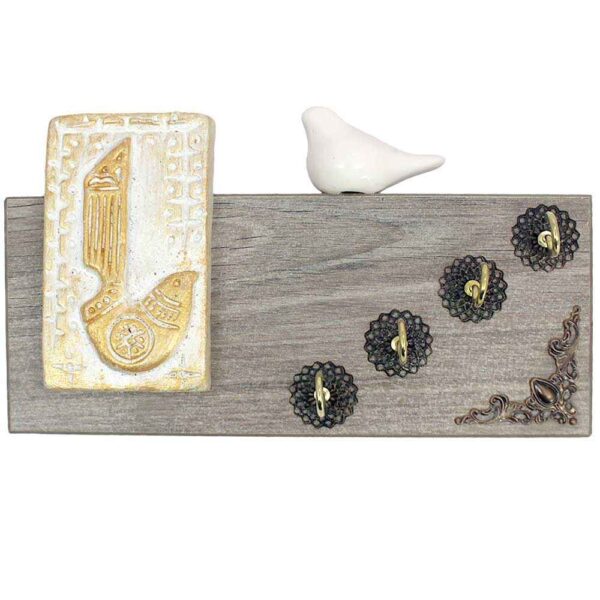 حامل مفاتيح جداري مزخرف ومصنوع يدويًا نموذج طائر