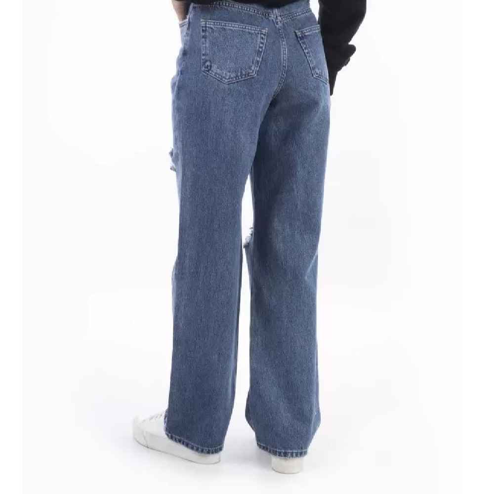 جينز فضفاض بقصة مريحة بتصميم ممزق لأسلوب غير رسمي