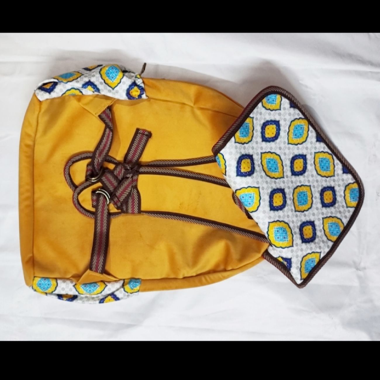 حقيبة ظهر نسائية من الجلد الصناعي بتصميم عرقي – موديل آريو