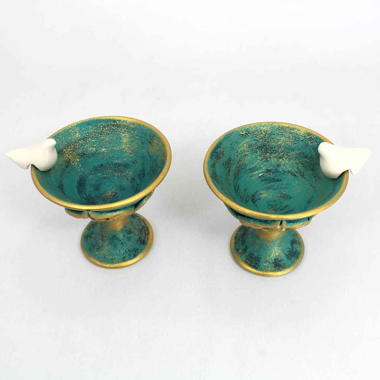 شمعدان فخار مصنوع يدوياً بتصميم العصفور