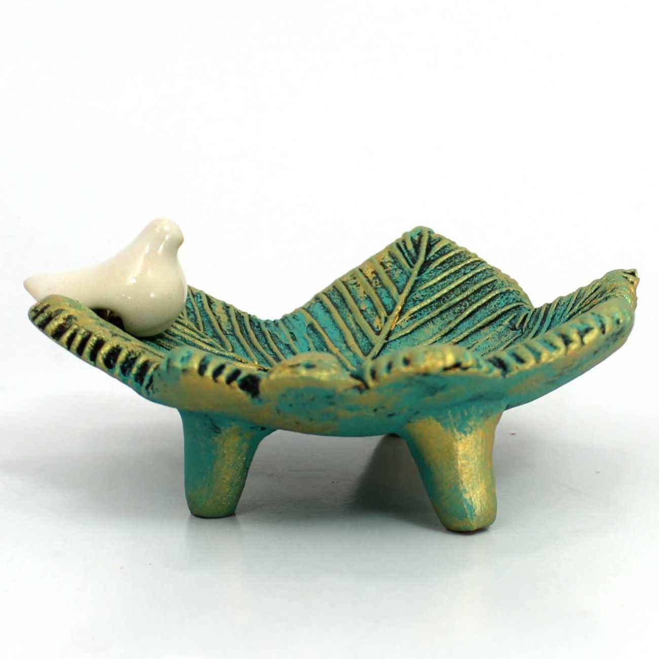 شمعدان فخار مصنوع يدوياً بتصميم الورقة والعصفور