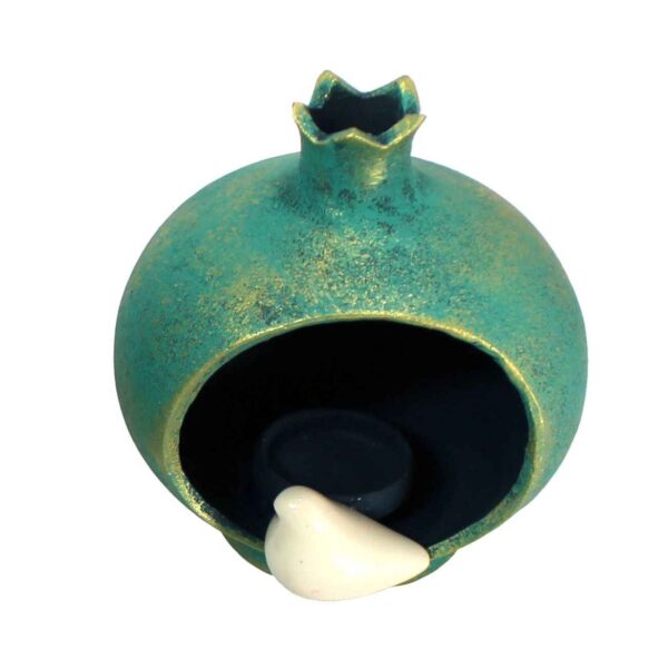 شمعدان فخار مصنوع يدوياً بتصميم الرمان