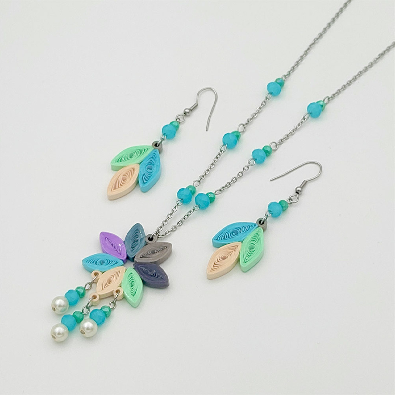 مجموعة مجوهرات فولاذية للنساء مصممة يدويًا موديل زهرة