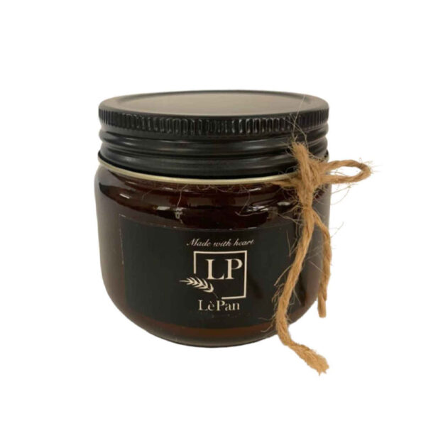 شمعة معطرة في جرة برائحة القهوة باللون البني