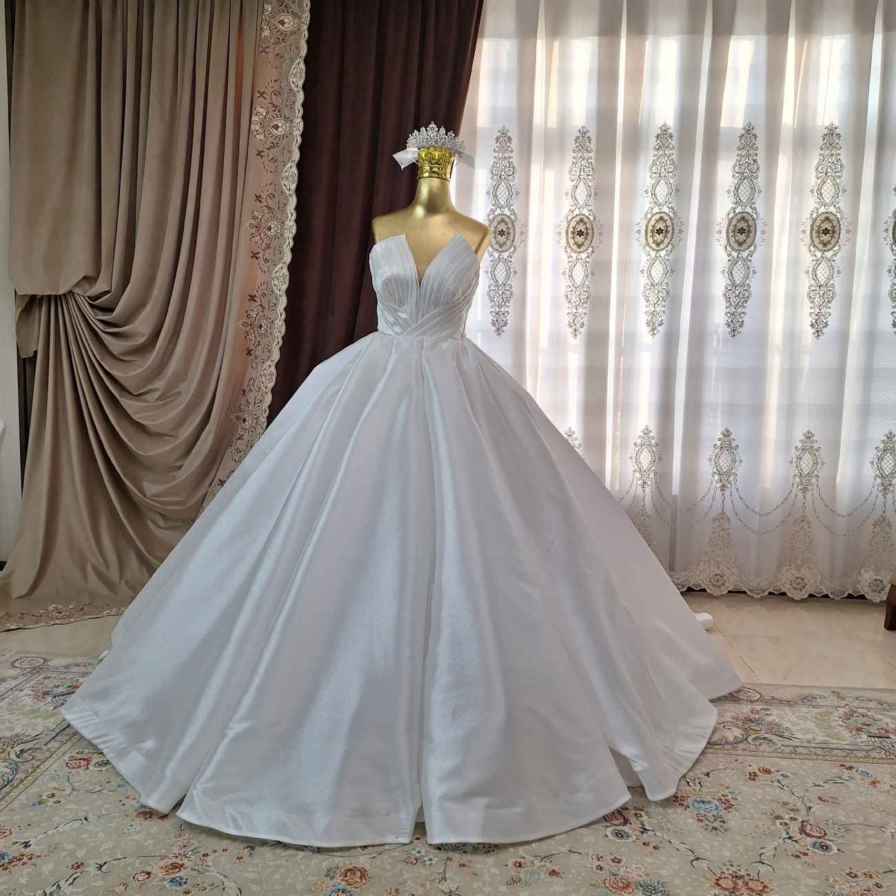 فستان زفاف إيراني - تصميم أنيق وعصري على الطراز العربي لكل عروس