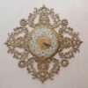 Luxurious-Brass-Wall-Clock-Featuring-a-Delicate-Floral-Accent
